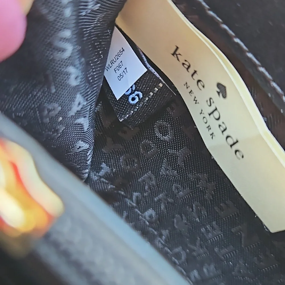 Kate Spade Chester Street Allyn Black Pebbled Leather Tassel Wallet